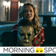 Judy Greer's Karen Nelson holds up the mask of Michael Myers in Halloween Kills.